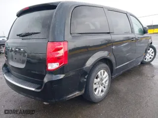 2019 Dodge Grand Caravan SE with VIN 2C4RDGBG7KR807428, listed as a IAAI auction lot 41538030 with 50,980 mi miles. Bid and sale history available at carsss.com. Image 4.