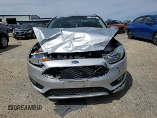 2015 Ford Focus SE with VIN 1FADP3K25FL312471, listed as a Copart auction lot 54981975 with 129,970 mi miles and Non Repairable. Bid and sale history available at carsss.com. Image 5.