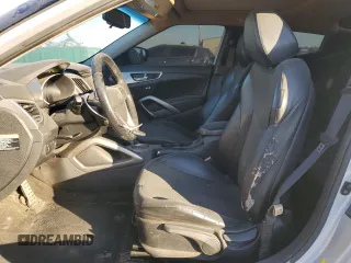 2012 Hyundai Veloster w/Gray Int с VIN KMHTC6AD2CU050738, выставлен на аукционе Copart как лот 42136435 с пробегом 151 482 миль миль и Списание • Salvage title. История ставок и продаж доступна на DreamBid. Изображение 7.