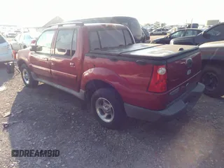 2005 Ford Explorer Sport Trac XLS z VIN 1FMZU67K45UB31837, wystawiony jako IAAI lot #32903073 z przebiegiem 127 538 mil mil oraz . Historia ofert i sprzedaży dostępna na DreamBid. Obrazek 3.