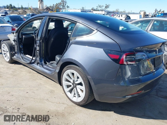 2022 Tesla Model 3 with VIN 5YJ3E1EA8NF241691, listed as a IAAI auction lot 41742584 with 70,375 mi miles and . Bid and sale history available at DreamBid. Image 3.
