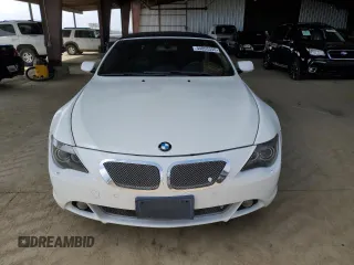 2006 BMW 6 Series 650Ci z VIN WBAEK134X6CN77921, wystawiony jako Copart lot #54093355 z przebiegiem 162 363 mil mil oraz Czysty tytuł • Clean title. Historia ofert i sprzedaży dostępna na DreamBid. Obrazek 5.