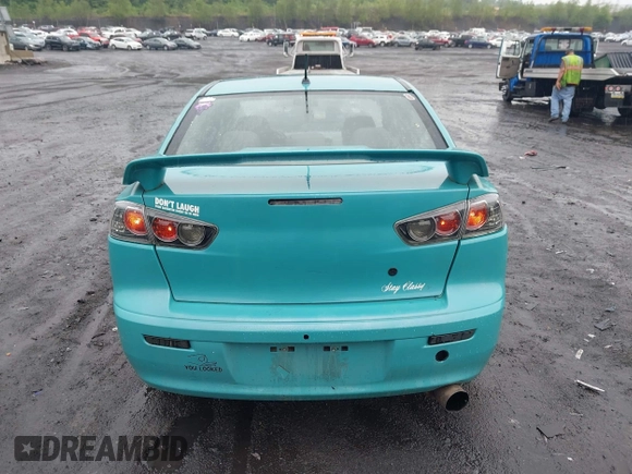 2013 Mitsubishi Lancer GT with VIN JA32U8FW6DU022878, listed as a IAAI auction lot 42449708 with 121,869 mi miles and . Bid and sale history available at DreamBid. Image 16.