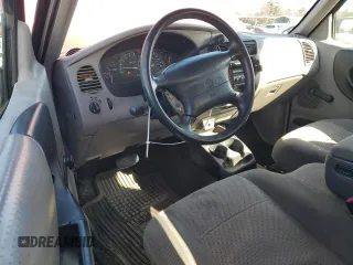 1999 Mazda B-Series 2WD Truck SE with VIN 4F4YR16V2XTM21901, listed as a Copart auction lot 42711145 with 316,993 mi miles and Salvage Title. Bid and sale history available at carsss.com. Image 8.