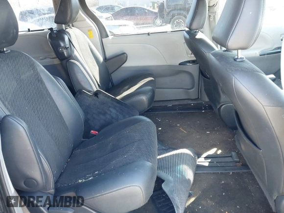 2014 Toyota Sienna SE with VIN 5TDXK3DC3ES521202, listed as a IAAI auction lot 41579320 with 182,982 mi miles and . Bid and sale history available at DreamBid. Image 8.