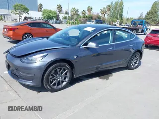 2020 Tesla Model 3 Standard Range Plus z VIN 5YJ3E1EA6LF703159, wystawiony jako IAAI lot #42099718 z przebiegiem 30 175 mil mil oraz . Historia ofert i sprzedaży dostępna na DreamBid. Obrazek 19.
