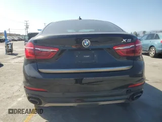 2018 BMW X6 sDrive35i z VIN 5UXKU0C54J0G69704, wystawiony jako Copart lot #57335475 z przebiegiem 61 777 mil mil oraz Szkoda całkowita • Salvage title. Historia ofert i sprzedaży dostępna na DreamBid. Obrazek 6.