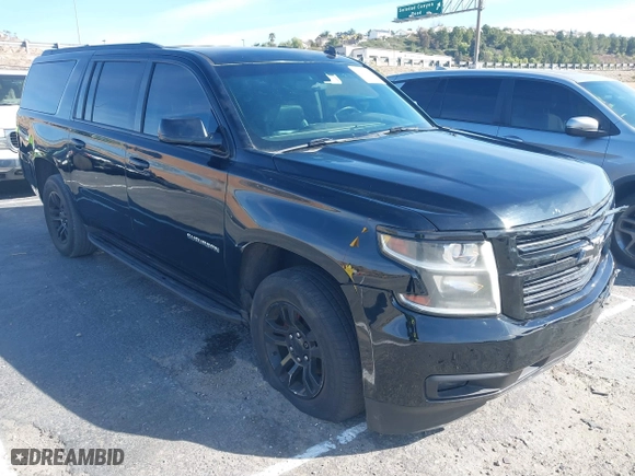 2015 Chevrolet Suburban LS with VIN 1GNSCHKC4FR247183, listed as a IAAI auction lot 41588924 with 283,741 mi miles. Bid and sale history available at carsss.com. Image 1.