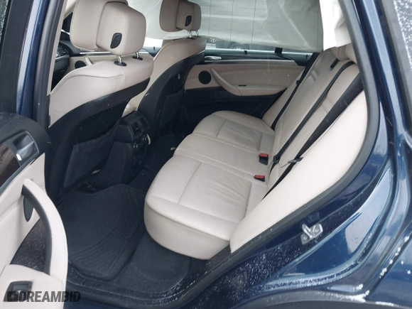 2011 BMW X5 35i with VIN 5UXZV4C54BL738262, listed as a IAAI auction lot 41633474 with 173,914 mi miles. Bid and sale history available at carsss.com. Image 8.