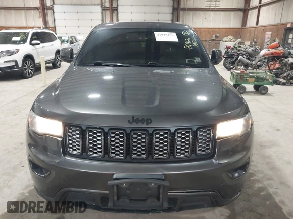 2017 Jeep Grand Cherokee Laredo with VIN 1C4RJFAG8HC910038, listed as a IAAI auction lot 41928179 with 76,862 mi miles. Bid and sale history available at carsss.com. Image 12.