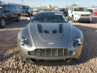 2011 Aston Martin V12 Vantage Carbon Black with VIN SCFEBBCF4BGS00791, listed as a Copart auction lot 76911374 with 8,207 mi miles and Salvage Title. Bid and sale history available at carsss.com. Image 5.
