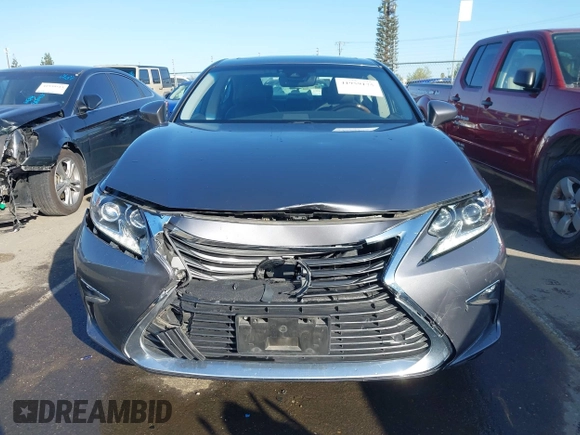 2016 Lexus ES 300h z VIN JTHBW1GG6G2108510, wystawiony jako IAAI lot #41959175 z przebiegiem 142 882 mil mil oraz . Historia ofert i sprzedaży dostępna na DreamBid. Obrazek 12.
