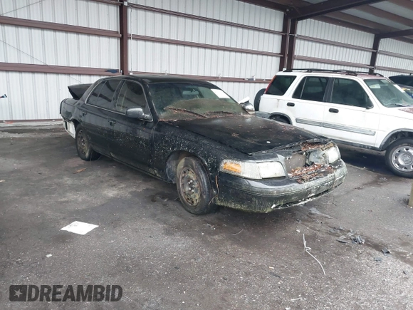 2000 Ford Crown Victoria Police Interceptor z VIN 2FAFP71W4YX199199, wystawiony jako IAAI lot #41610176 z przebiegiem 202 131 mil mil oraz . Historia ofert i sprzedaży dostępna na DreamBid. Obrazek 1.
