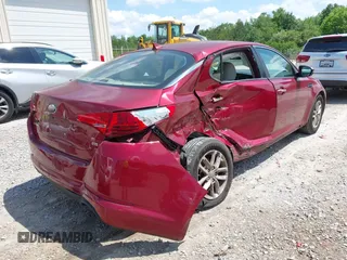 2013 Kia Optima LX z VIN 5XXGM4A73DG187566, wystawiony jako IAAI lot #42136713 z przebiegiem 73 406 mil mil oraz . Historia ofert i sprzedaży dostępna na DreamBid. Obrazek 6.