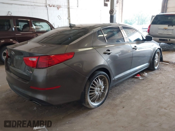 2015 Kia Optima EX with VIN 5XXGN4A73FG372426, listed as a IAAI auction lot 42630287 with 154,060 mi miles and . Bid and sale history available at DreamBid. Image 4.