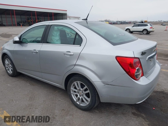 2012 Chevrolet Sonic LT with VIN 1G1JC5SH0C4162034, listed as a IAAI auction lot 41967195 with 87,086 mi miles and . Bid and sale history available at DreamBid. Image 3.