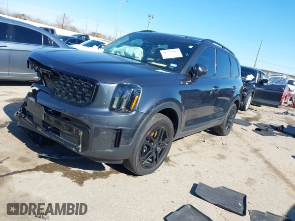 2024 Kia Telluride EX X-Line z VIN 5XYP3DGC3RG519595, wystawiony jako IAAI lot #41377285 z przebiegiem 18 313 mil mil oraz . Historia ofert i sprzedaży dostępna na DreamBid. Obrazek 2.