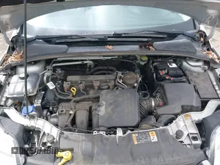2014 Ford Focus SE with VIN 1FADP3F24EL323728, listed as a IAAI auction lot 41826974 with 141,357 mi miles and . Bid and sale history available at DreamBid. Image 10.
