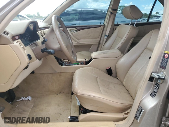 2002 Mercedes-Benz E-Class with VIN WDBJF65J82B397776, listed as a Copart auction lot 73745144 with 0 mi miles and Salvage Title. Bid and sale history available at carsss.com. Image 7.