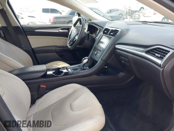 2016 Ford Fusion Titanium with VIN 3FA6P0SU9GR145186, listed as a IAAI auction lot 42023484 with 84,399 mi miles and . Bid and sale history available at DreamBid. Image 5.