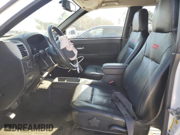 2012 Chevrolet Colorado z VIN 1GCHTDFP0C8114818, wystawiony jako Copart lot #86083664 z przebiegiem 124 078 mil mil oraz Szkoda całkowita • Salvage title. Historia ofert i sprzedaży dostępna na DreamBid. Obrazek 7.