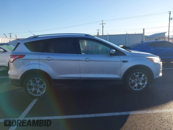 2014 Ford Escape Titanium with VIN 1FMCU9J94EUD01966, listed as a IAAI auction lot 41226043 with 132,730 mi miles. Bid and sale history available at carsss.com. Image 13.