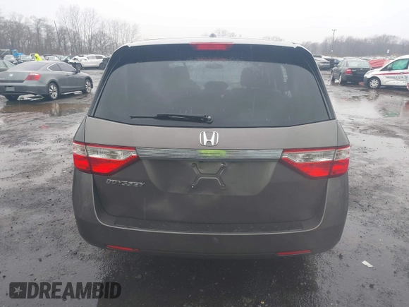 2012 Honda Odyssey EX-L with VIN 5FNRL5H64CB037689, listed as a IAAI auction lot 41857822 with 121,601 mi miles and . Bid and sale history available at carsss.com. Image 16.