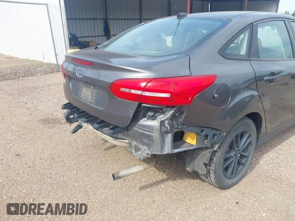 2018 Ford Focus SE with VIN 1FADP3F29JL288761, listed as a IAAI auction lot 42290510 with 93,463 mi miles and . Bid and sale history available at DreamBid. Image 19.