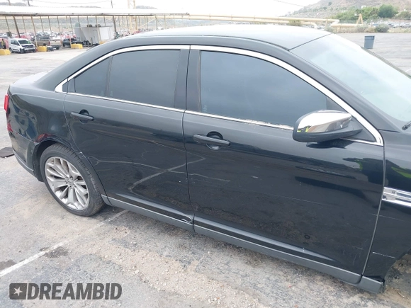2013 Ford Taurus Limited z VIN 1FAHP2F83DG138318, wystawiony jako IAAI lot #42375200 z przebiegiem 229 471 mil mil oraz . Historia ofert i sprzedaży dostępna na DreamBid. Obrazek 13.
