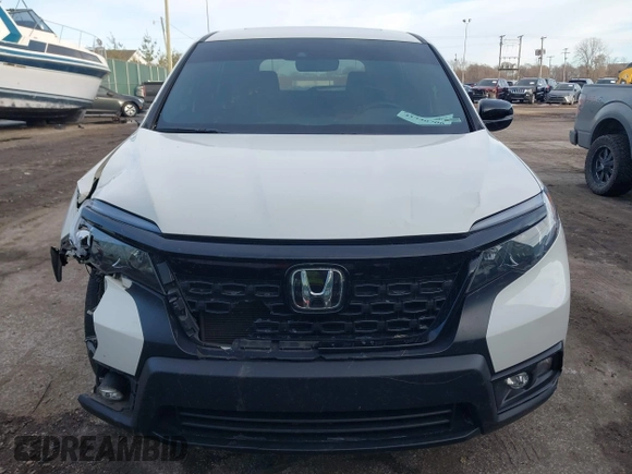 2019 Honda Passport EX-L with VIN 5FNYF8H5XKB008904, listed as a IAAI auction lot 41440706 with 57,317 mi miles and . Bid and sale history available at DreamBid. Image 12.