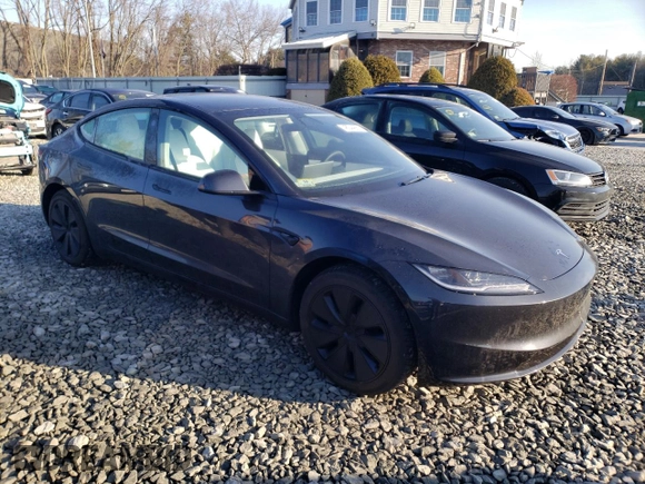 2024 Tesla Model 3 with VIN 5YJ3E1EA2RF859983, listed as a Copart auction lot 48044865 with 2,277 mi miles and Salvage Title. Bid and sale history available at DreamBid. Image 4.