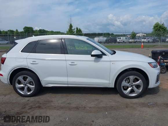 2023 Audi Q5 S line Premium Plus z VIN WA1EAAFY9P2148081, wystawiony jako IAAI lot #42436508 z przebiegiem 25 877 mil mil oraz . Historia ofert i sprzedaży dostępna na DreamBid. Obrazek 13.