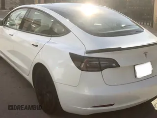2021 Tesla Model 3 Standard Range Plus with VIN 5YJ3E1EA2MF854372, listed as a Copart auction lot 56435825 with 44,637 mi miles and Salvage Title. Bid and sale history available at DreamBid. Image 3.