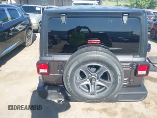 2021 Jeep Wrangler Unlimited Sport S with VIN 1C4HJXDG3MW801301, listed as a IAAI auction lot 42319387 with Not provided miles and . Bid and sale history available at DreamBid. Image 16.