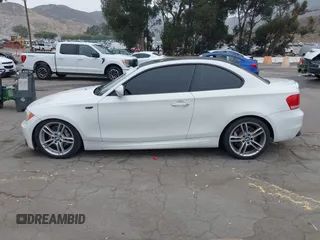 2013 BMW 1 Series 135i with VIN WBAUC9C54DVY60154, listed as a IAAI auction lot 42354743 with 159,571 mi miles and . Bid and sale history available at DreamBid. Image 14.