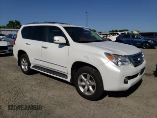 2010 Lexus GX 460 Premium with VIN JTJJM7FX6A5001418, listed as a Copart auction lot 52404285 with 169,065 mi miles and Salvage title. Bid and sale history available at DreamBid. Image 4.