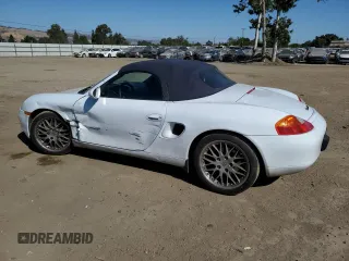 1999 Porsche Boxster с VIN WP0CA2981XU626335, выставлен на аукционе Copart как лот 58570495 с пробегом 140 751 миль миль и Списание • Salvage title. История ставок и продаж доступна на DreamBid. Изображение 2.