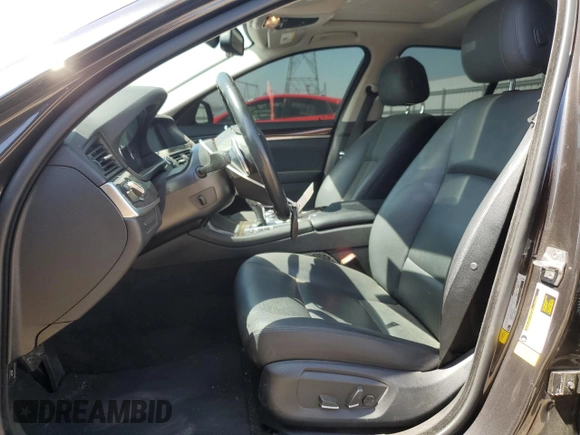 2016 BMW 5 Series 528i with VIN WBA5A5C51GG351554, listed as a Copart auction lot 61210265 with 73,968 mi miles and Salvage title. Bid and sale history available at DreamBid. Image 7.