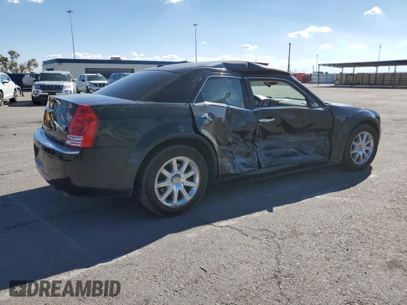 2009 Chrysler 300 with VIN 2C3KA63T69H626101, listed as a Copart auction lot 70259914 with 172,078 mi miles and Salvage Title. Bid and sale history available at carsss.com. Image 3.