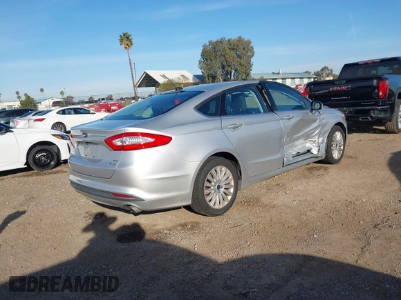 2014 Ford Fusion SE Hybrid with VIN 3FA6P0LU4ER206343, listed as a IAAI auction lot 41600260 with 198,834 mi miles and . Bid and sale history available at DreamBid. Image 4.