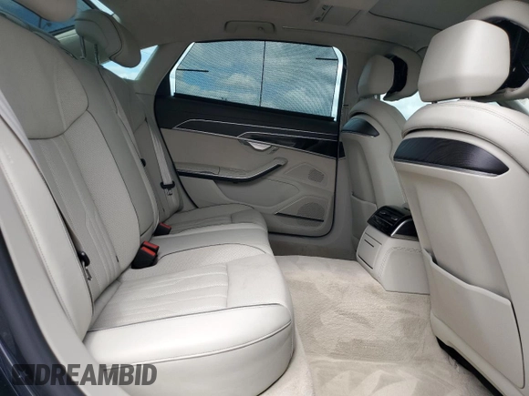 2019 Audi A8 z VIN WAU8DAF80KN010332, wystawiony jako Copart lot #55418865 z przebiegiem 17 282 mil mil oraz Szkoda całkowita • Salvage title. Historia ofert i sprzedaży dostępna na DreamBid. Obrazek 10.