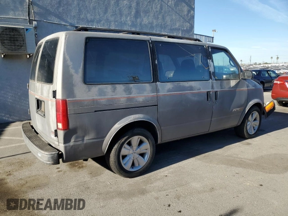 1992 Chevrolet Astro with VIN 1GNDM19Z3NB219051, listed as a Copart auction lot 41997675 with 242,745 mi miles and Salvage Title. Bid and sale history available at carsss.com. Image 3.