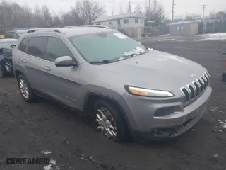 2014 Jeep Cherokee Latitude with VIN 1C4PJLCBXEW299124, listed as a IAAI auction lot 41553472 with 151,893 mi miles. Bid and sale history available at carsss.com. Image 1.