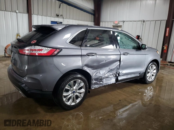 2021 Ford Edge Titanium with VIN 2FMPK4K96MBA38750, listed as a Copart auction lot 61401615 with 34,778 mi miles and Salvage title. Bid and sale history available at DreamBid. Image 3.