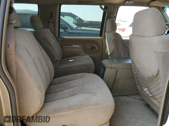 1999 Chevrolet Suburban with VIN 3GNEC16R2XG144591, listed as a Copart auction lot 65368364 with 244,605 mi miles and Non Repairable. Bid and sale history available at carsss.com. Image 11.