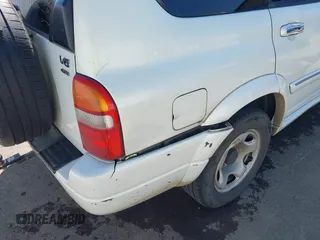 2002 Suzuki XL7 Standard z VIN JS3TX92V324125187, wystawiony jako IAAI lot #42195273 z przebiegiem 243 050 mil mil oraz . Historia ofert i sprzedaży dostępna na DreamBid. Obrazek 6.