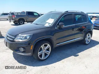 2014 Volkswagen Tiguan SEL with VIN WVGAV3AX4EW025339, listed as a IAAI auction lot 42313665 with 96,756 mi miles and . Bid and sale history available at DreamBid. Image 17.