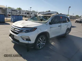 2018 Honda Pilot Touring with VIN 5FNYF6H91JB034488, listed as a Copart auction lot 63128415 with Not provided miles and Salvage title. Bid and sale history available at DreamBid. Image 1.