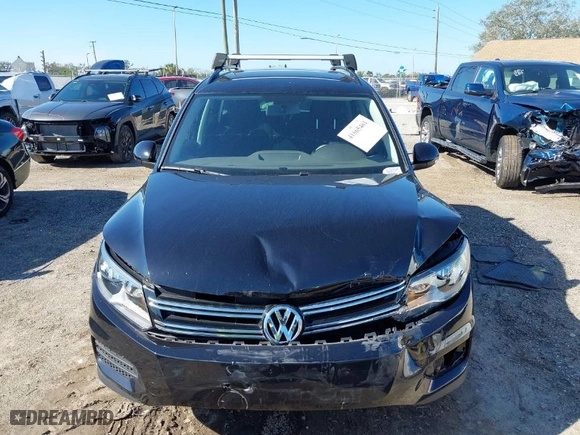 2017 Volkswagen Tiguan S with VIN WVGAV7AX2HK051246, listed as a IAAI auction lot 41665461 with 63,531 mi miles. Bid and sale history available at carsss.com. Image 12.
