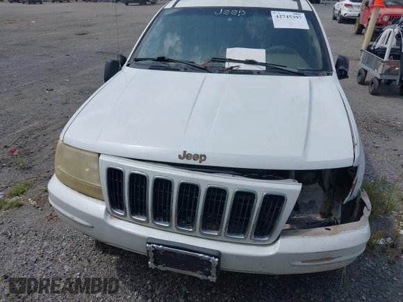2002 Jeep Grand Cherokee Limited z VIN 1J4GX58N62C195783, wystawiony jako IAAI lot #42745397 z przebiegiem 242 502 mil mil oraz . Historia ofert i sprzedaży dostępna na DreamBid. Obrazek 6.